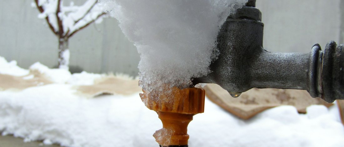 ice on a frozen tap outside
