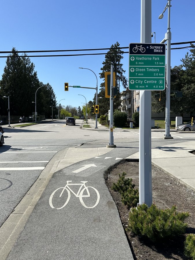 wayfinding sign on pole