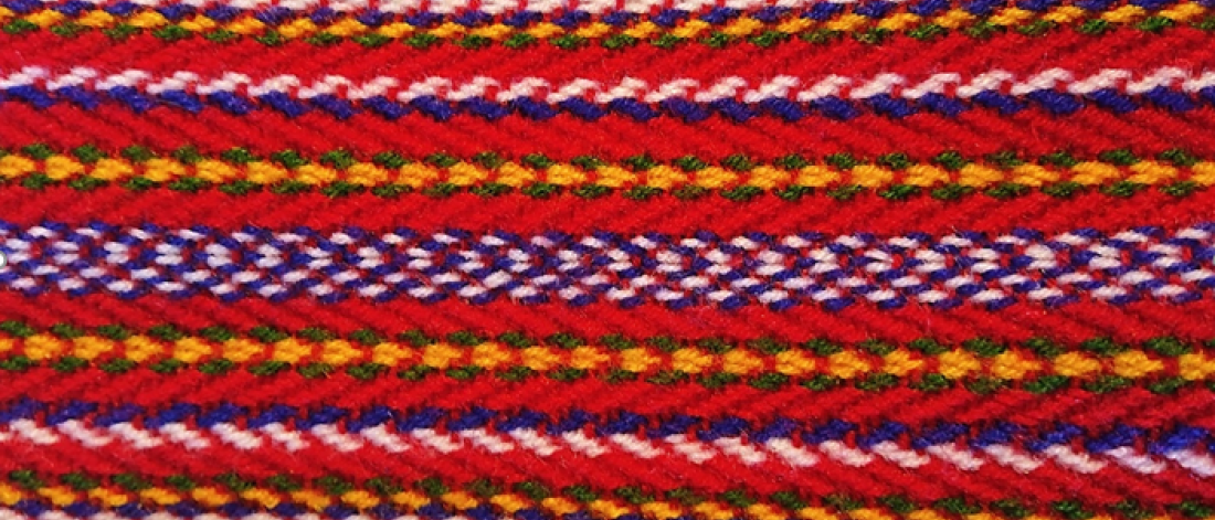 a traditional sash featuring intricate patterns and details